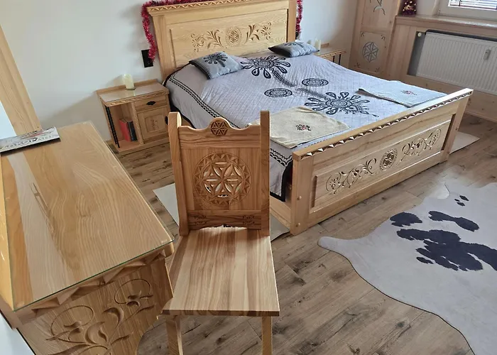 Apartament Zakopane utrzymany w stylu góralskiej chaty