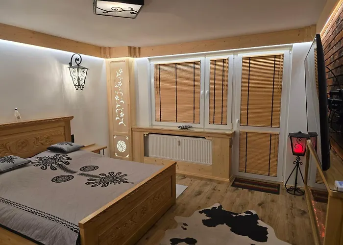 Apartament Zakopane utrzymany w stylu góralskiej chaty
